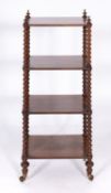 A Victorian rosewood whatnot,