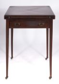 An Edwardian mahogany envelope card table,