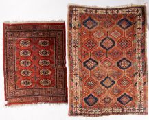 A North West Persian rug, the field with indigo, rose,
