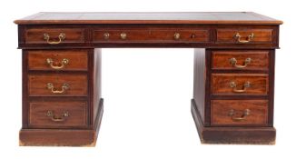 A mahogany pedestal desk in George III style,