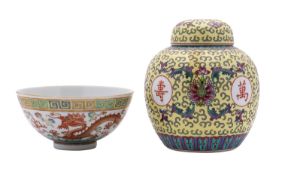 A Chinese dragon bowl and a modern jar and cover the interior painted with a dragon medallion,