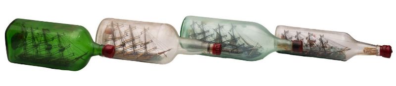 Four various model ships in bottles, including one of the clipper 'Sea Splendor'.