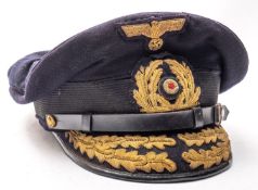 A German Officer's visored cap, for the rank of Kommodore to Admiral:,