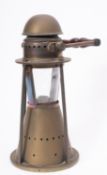 A brass circular hand lantern, maker Bulpitt & Sons,