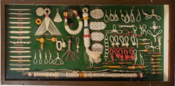A framed ropework display, unsigned possibly by Ray Tucknott, with examples of star knots,