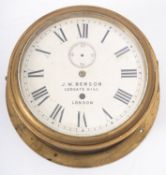 A brass bulkhead clock, maker J W Benson, Ludgate Hill, London,