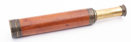 A 19th century mahogany and brass three draw telescope,maker Molton, Norwich,