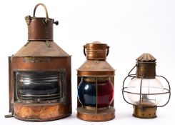 A copper and brass Bow Port lantern, unsigned with original burner, 46cm high,