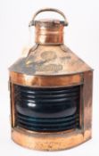 A copper and brass starboard lamp, maker Grimsby Plumbing Company,