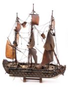 A scratch built model of HMS 'Victory' fully rigged over painted block hull with open ports and