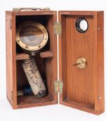 A brass 2 inch hand held compass,