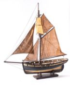 A scale model of the brig 'Martyr', fully rigged over a plank and pinned deck with fitting ,