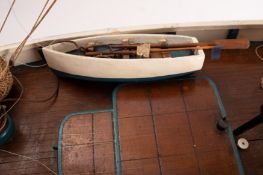 A scale model of a Penzance Lugger 'PZ207': set full sail over simulated plank deck, with capstan,
