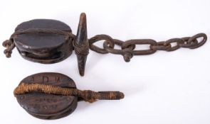 A 18th/ early 19th century century ship's block, with rope work strop,