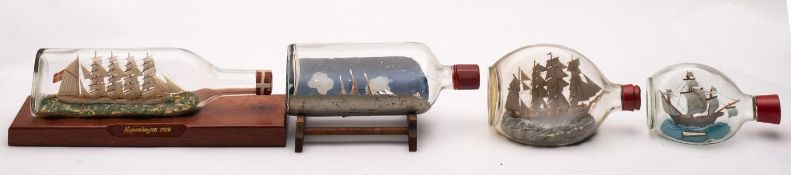 Four various model ships in bottles, comprising 'Kopenhagen', 'Stana Maria', a Barque,