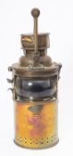 A circular brass signal lantern, maker Player & Mitchell, Birmingham,