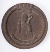 A bronze tompion for the Royal Navy Town-class cruiser HMs 'Glasgow', 22.5cm diameter.