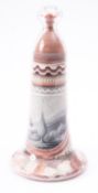 An Alum Bay Sand bell souvenir, one side with a vignette of the needles, Isle of Wight,