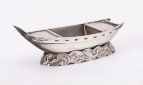 A Chinese silver model of a rowing boat, 18.2g, 7.3cm long.