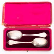 A cased pair of silver picture back dog nose tablespoons by Thomas Bradbury & Son, Sheffield 1926,