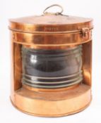 A copper ship's lamp, stamped ' No.2775', 41cm high (fitted later electrical conversion).
