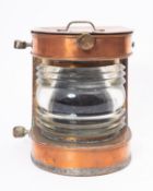 A Dutch copper ship's lamp, maker Charles Simon, Ostende, maker's plaque to top as per title,