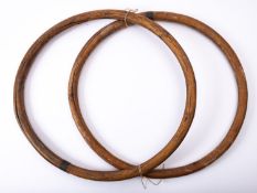 Two bentwood and brass bound mast hoops,