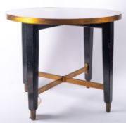A circular brass and ebonised coffee table from the Maple Room of the Cunard Ocean Liner RMS