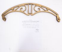 A brass ceremonial tallier from a launch of HMS Repulse, of pierced scroll design,