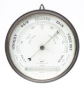 An early 20th century lacquered brass bulkhead aneroid barometer, unsigned,