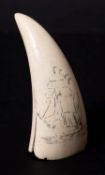 A Scrimshaw decorated tooth with incised image of a sailing ship and sailor, 10.