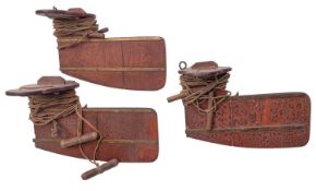 Three early 20th Century brass mounted rowing sweep boat rudders,