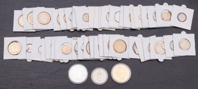A collection of decimal currency and £2 coins and 50 pence, £5 coins, with Britannia 1998,