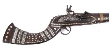 An Indian flintlock mother of pearl inlaid Jezail,