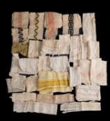 A collection of Romanian cotton embroidery swatches and cotton lace