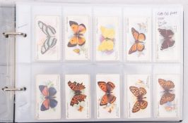 Cigarette card album; Characters from Charles Dickens 40, Butterflies by John Players & Son 48,