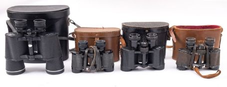 A group of twelve cased pairs of binoculars, various makers including Delaine, Paris,