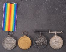 A collection of four WWI medals,
