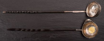 A George III toddy ladle, not marked with George I 1723 coin inset and spiral whalebone handle,