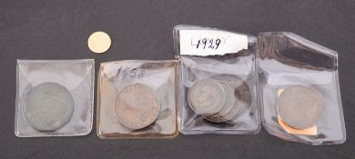 A 1869 penny, two Lundy Puffins, two Lundy half puffins, 1853 and 1854 half penny,