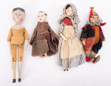 Two early 20th century wooden Peg dolls,
