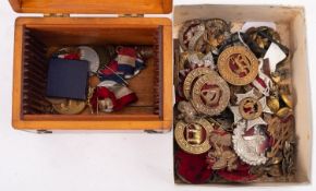 A collection of various Regimental caps, badges and buttons, including 'North Staffordshire',