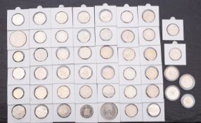 Approximately thirty Olympic 50ps, with others, three £2 and three £1 coins.