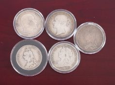 A box containing crowns, 1844/ 1899/ 1888 and 1902, with 1887 double Florin.
