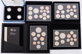 Boxed royal Mint sets, 2009, 2010,2011,2012, with box of four silver proof £1 coins.