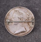 A Victorian Royal Naval LSGC Medal converted to a brooch, name to edge for 'J J Wilkie ,