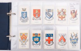 Cigarette card album; School Badgers by Cavendish Ltd 25, Dogs second series by Gallaher Ltd 48,