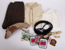 Gulf War: a small collection of badges relating to Desert Storm, including a set of Saudi dress,