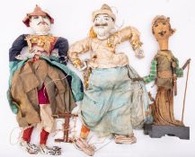Two Javanese wooden painted marionettes and a rod puppet (3)