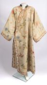 An early 20th century Chinese silk coat, velvet collar,